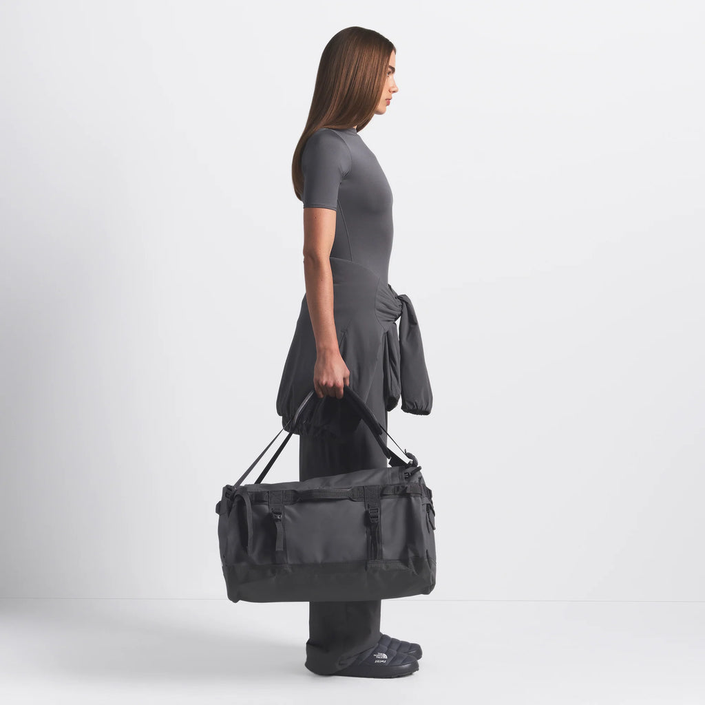 THE NORTH FACE X SKIMS SMALL BASE CAMP DUFFLE BAG | GUNMETAL