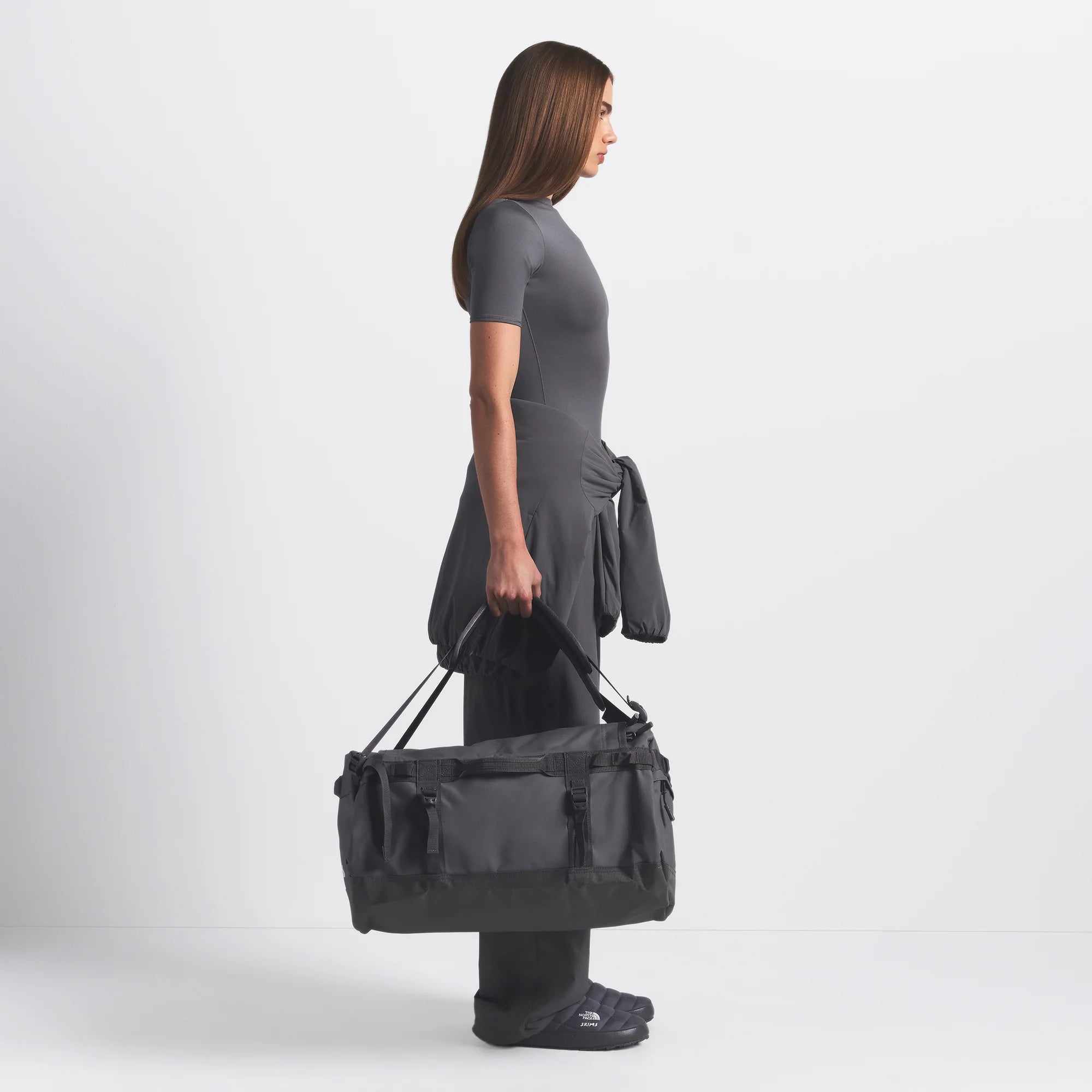 THE NORTH FACE X SKIMS SMALL BASE CAMP DUFFLE BAG | GUNMETAL