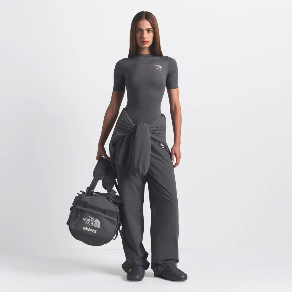 THE NORTH FACE X SKIMS SMALL BASE CAMP DUFFLE BAG | GUNMETAL