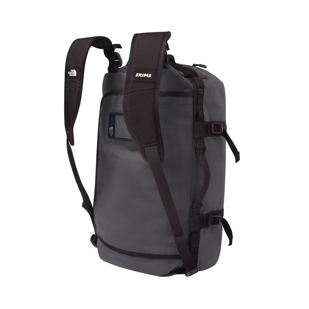 THE NORTH FACE X SKIMS SMALL BASE CAMP DUFFLE BAG | PHOENIX