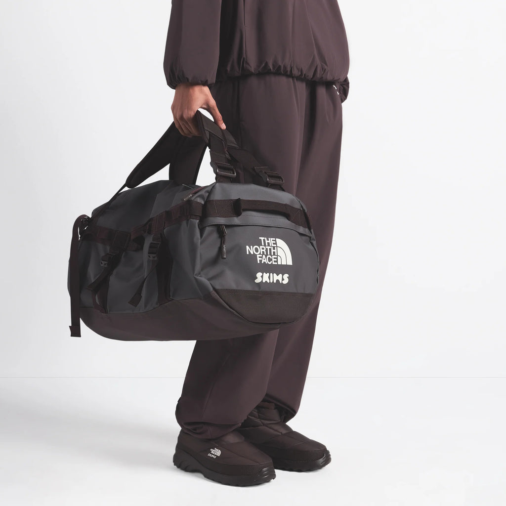 THE NORTH FACE X SKIMS SMALL BASE CAMP DUFFLE BAG | PHOENIX