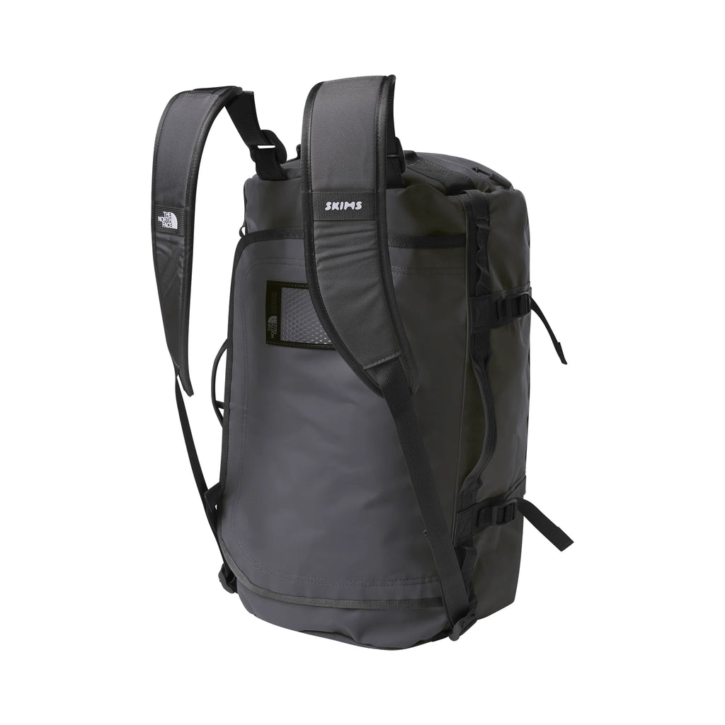 THE NORTH FACE X SKIMS SMALL BASE CAMP DUFFLE BAG | GUNMETAL
